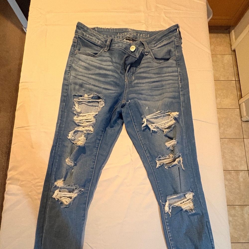 Woman’s distressed skinny jeans